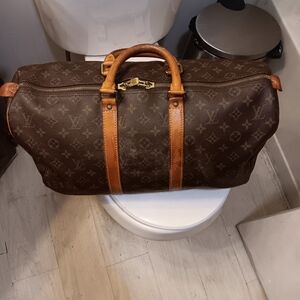 LUIS VUITTON CARRYALL